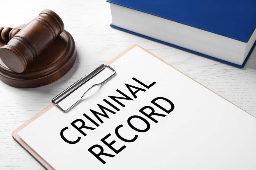 Gavel and legal books on criminal record expungement in Texas.
