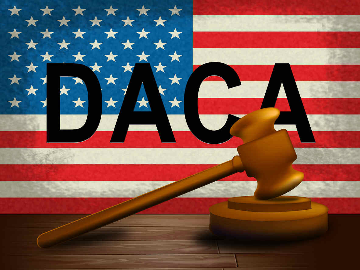 American flag background with a gavel and 'DACA' text, representing DACA legal services.