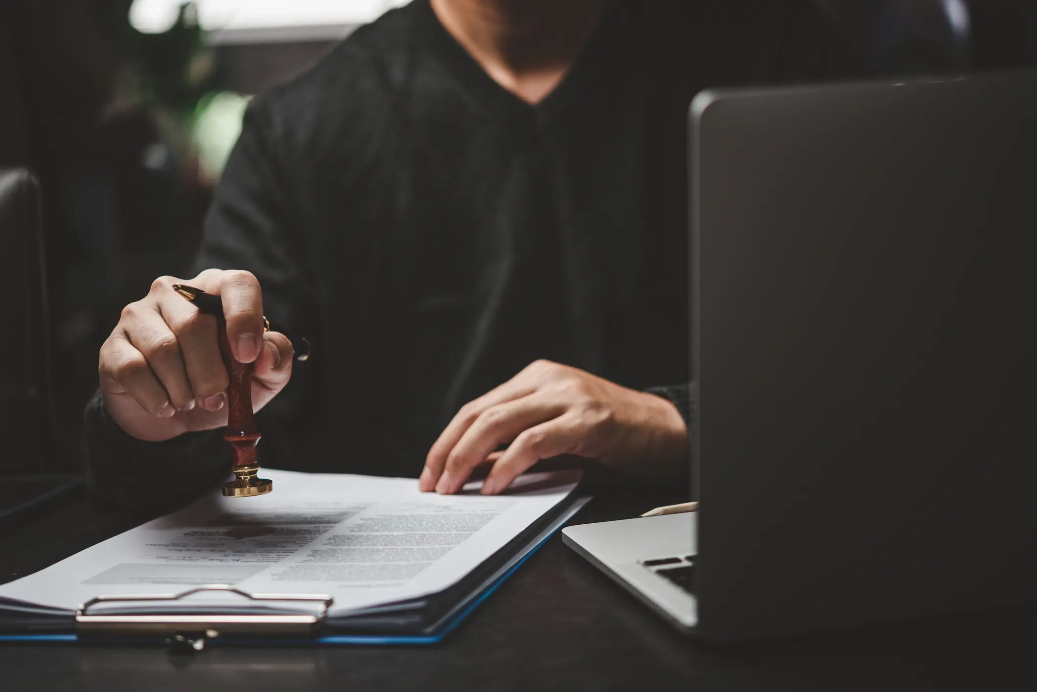 Austin immigration attorney reviewing legal documents during an immigration consultation